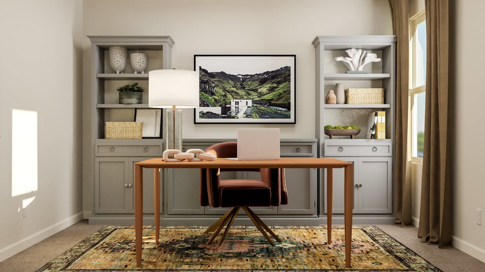 A room with a desk and a computer.
