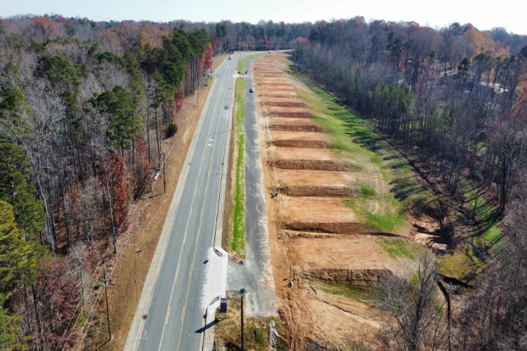 A highway with a car on it.