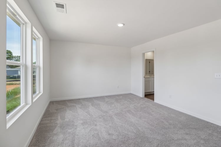 A hallway with white walls.