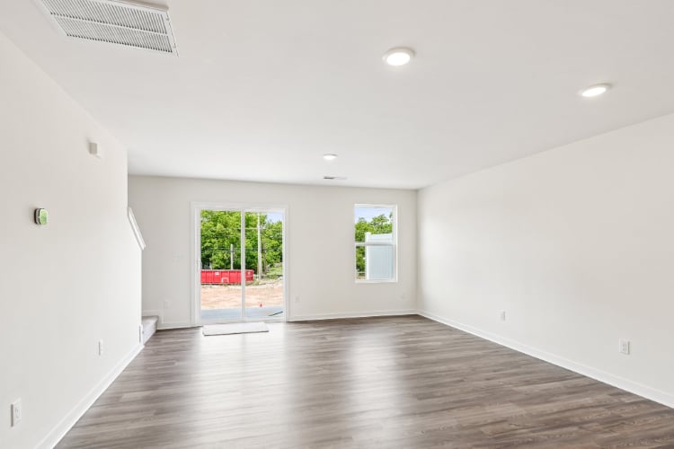 A room with a wood floor and a wood floor with a wood floor.