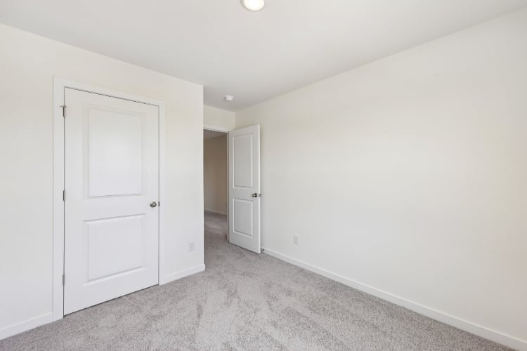 A room with white doors.