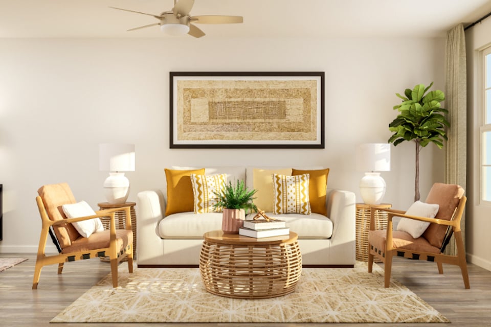 A living room with a couch and chairs.