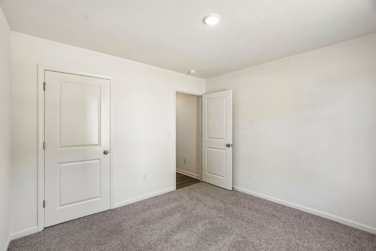 A room with white doors.