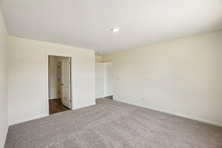A room with carpet and a carpet.