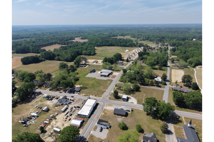 An aerial view of a parking lot.
