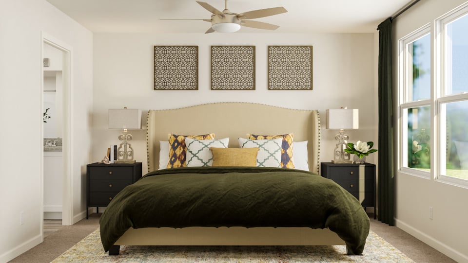 A bedroom with a large bed.