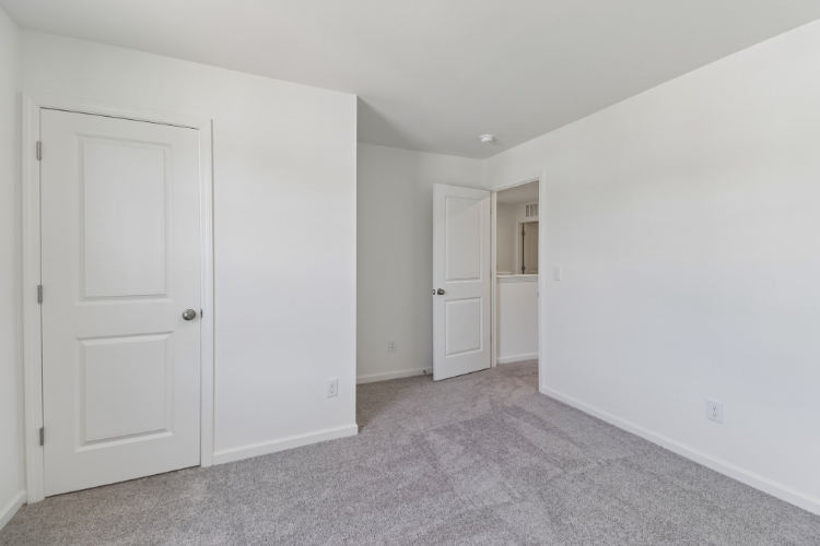 A room with white doors.