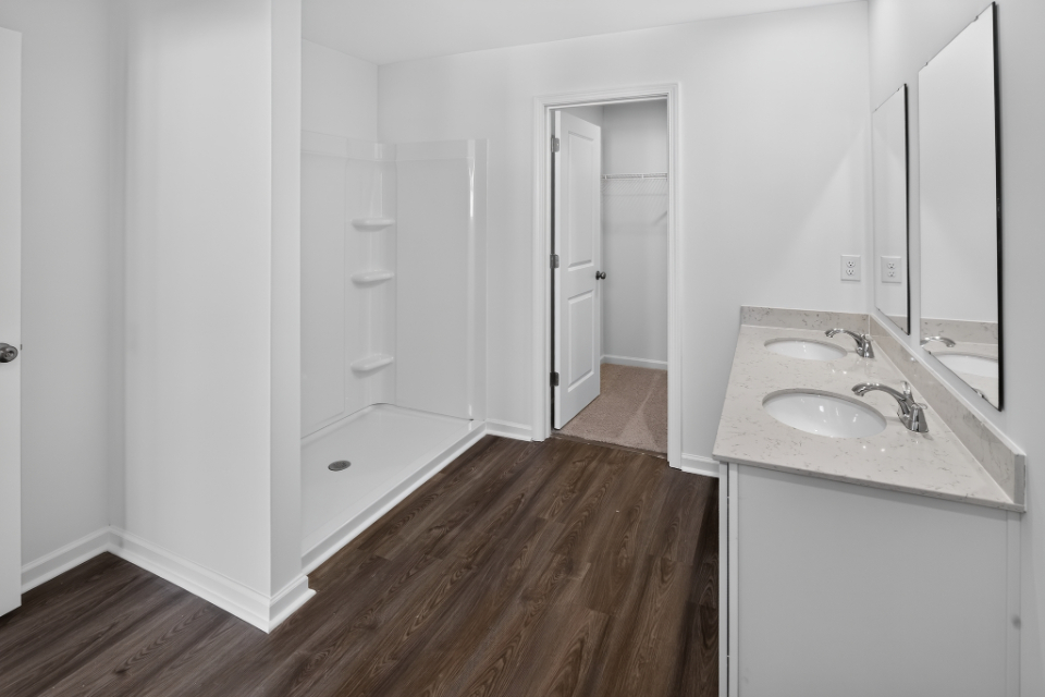 A bathroom with a sink and a bathtub.