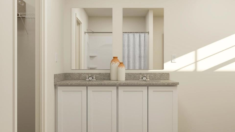 A bathroom with a marble countertop.