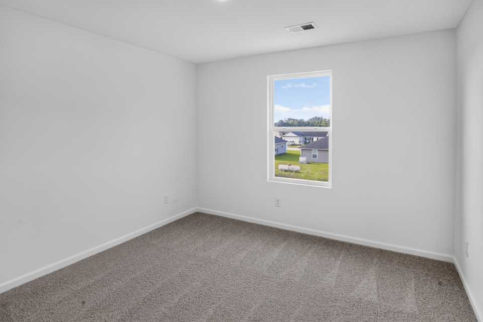 A room with a large window.