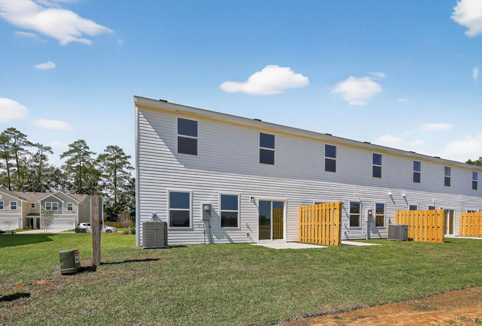 A house with a fence around it.