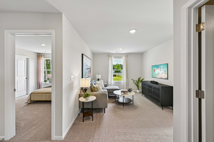 A living room with a tv and couches.