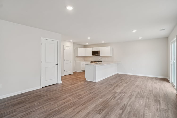 A room with white cabinets.