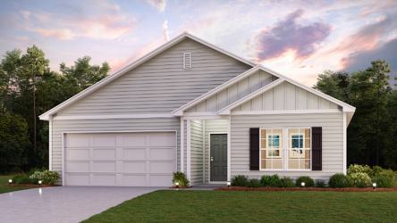 A white house with a lawn.