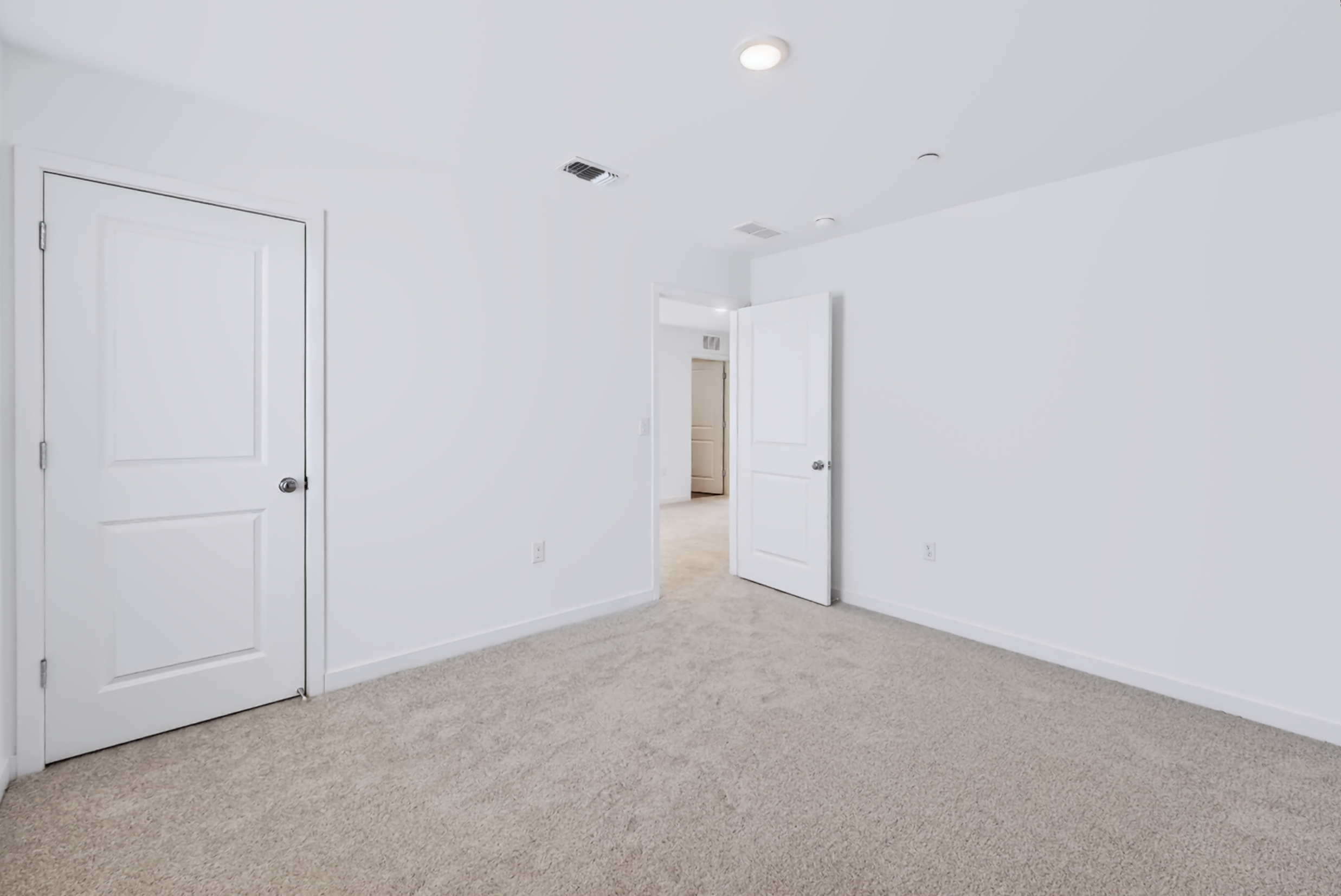 A room with white doors.