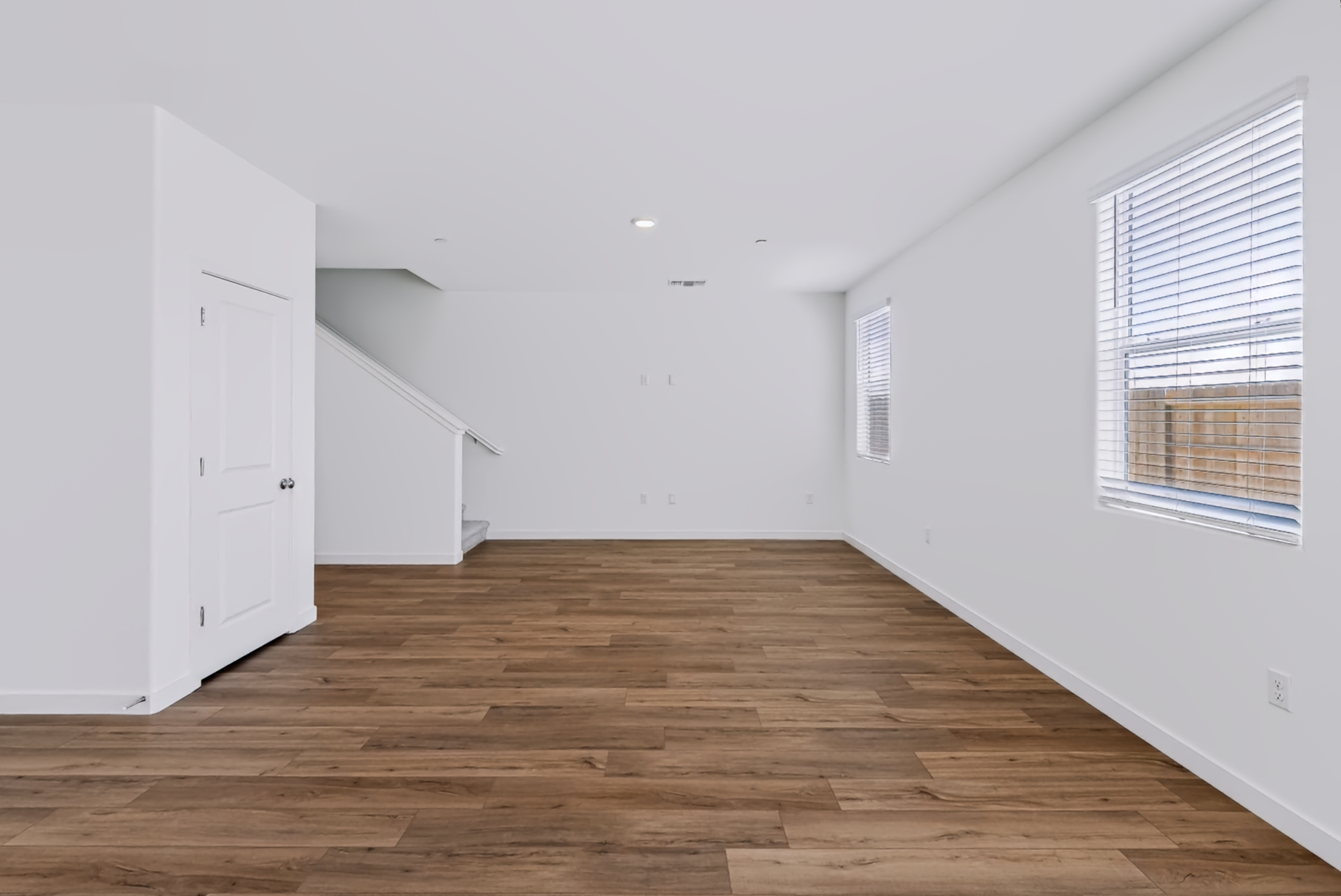 A room with white cabinets.