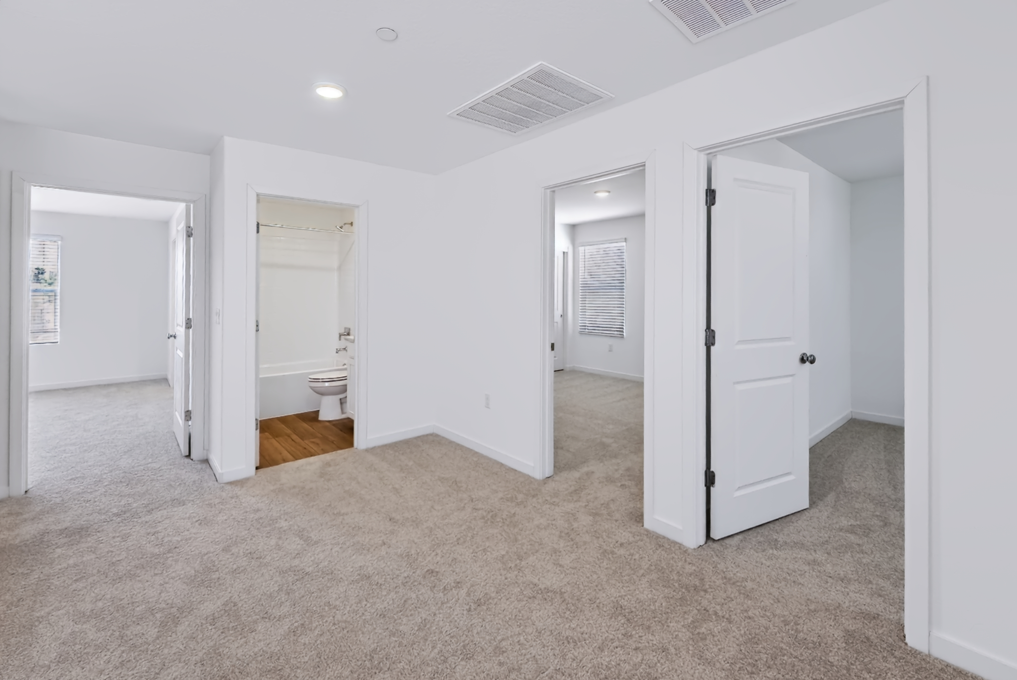 A room with white doors.