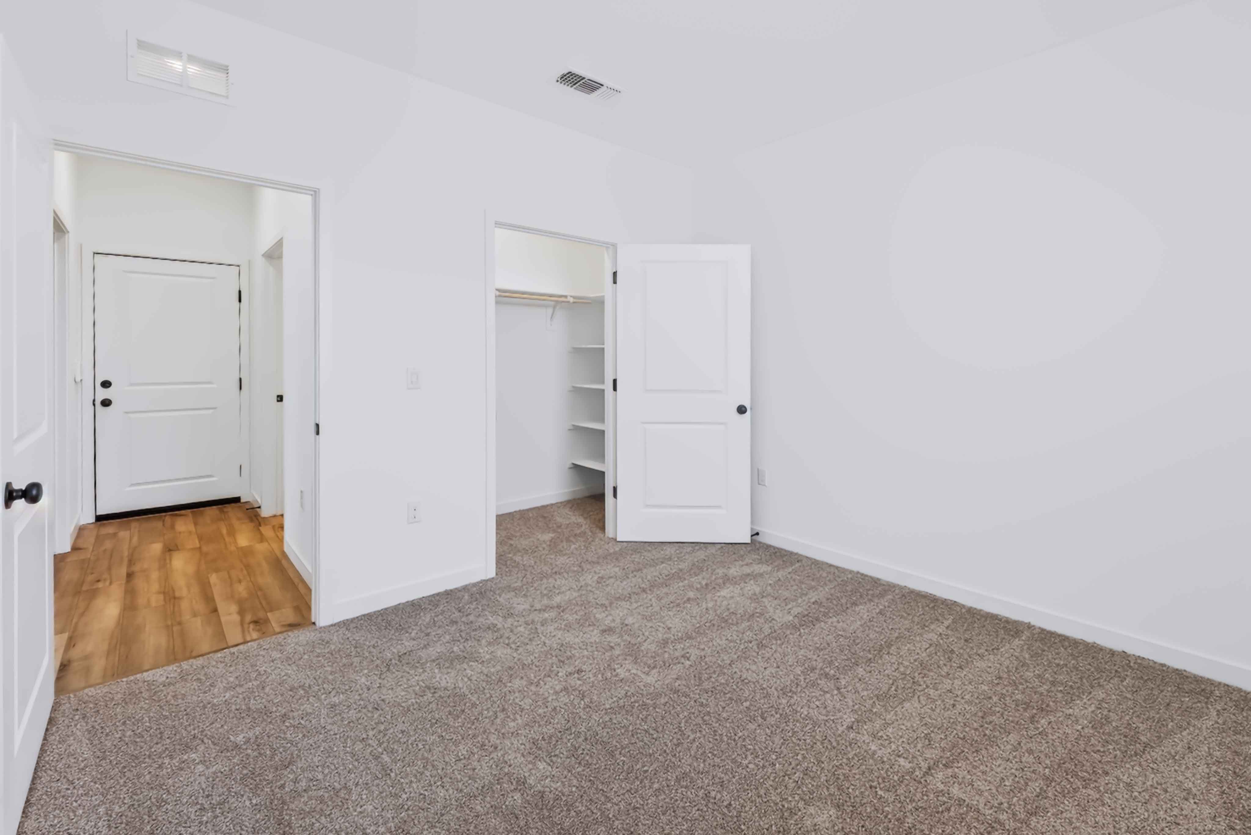 A room with white doors.