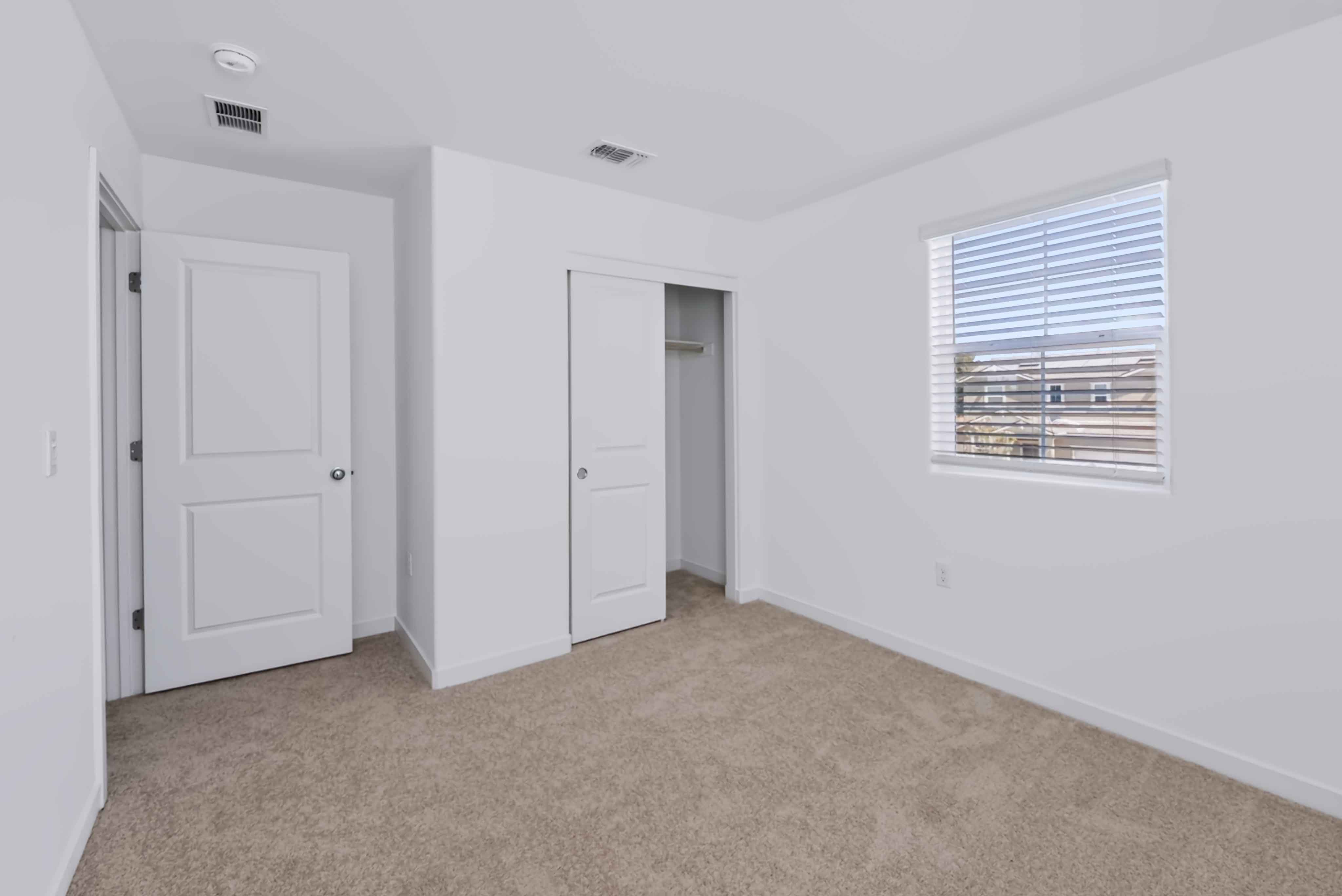 A room with white doors.