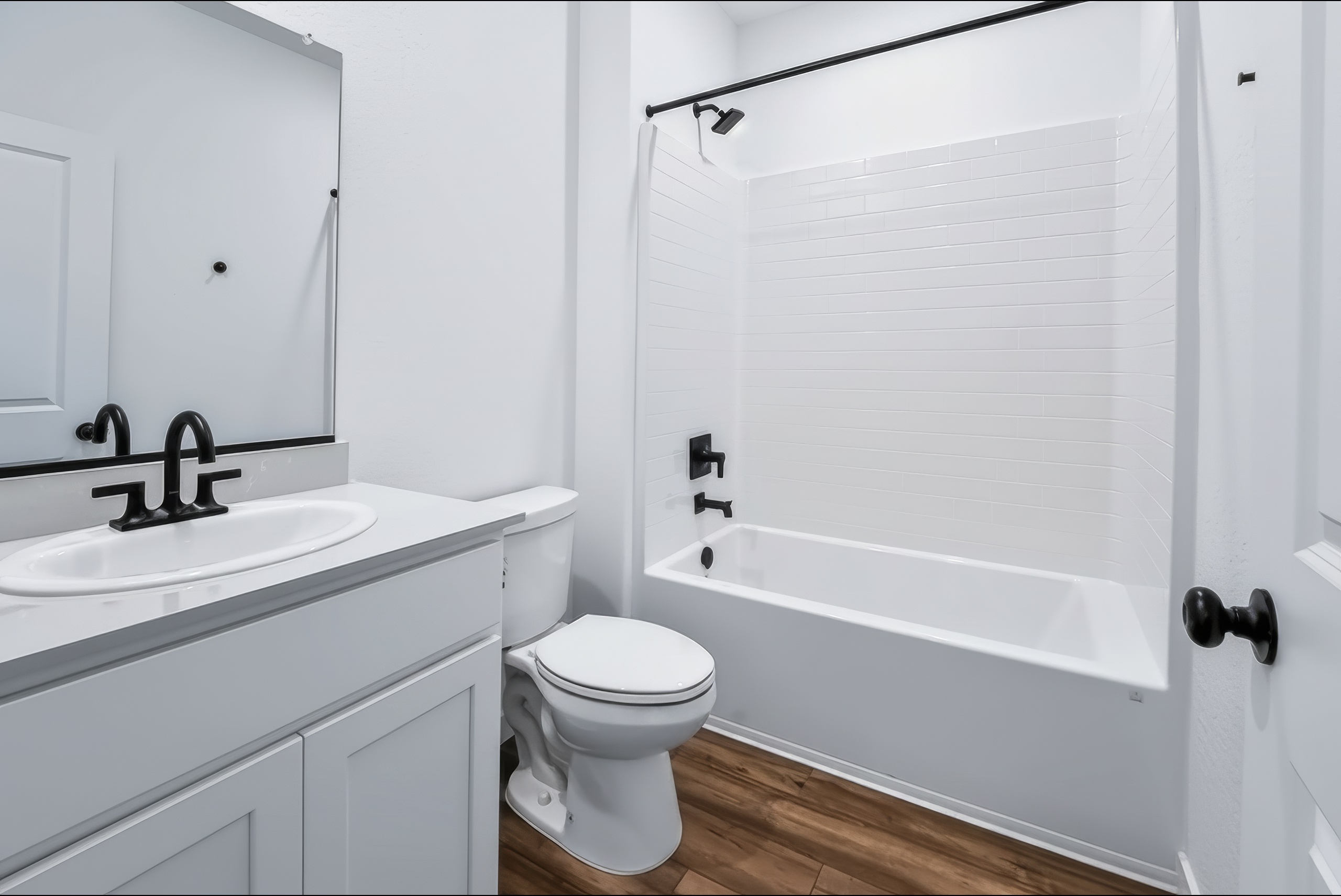 A bathroom with a toilet and sink.