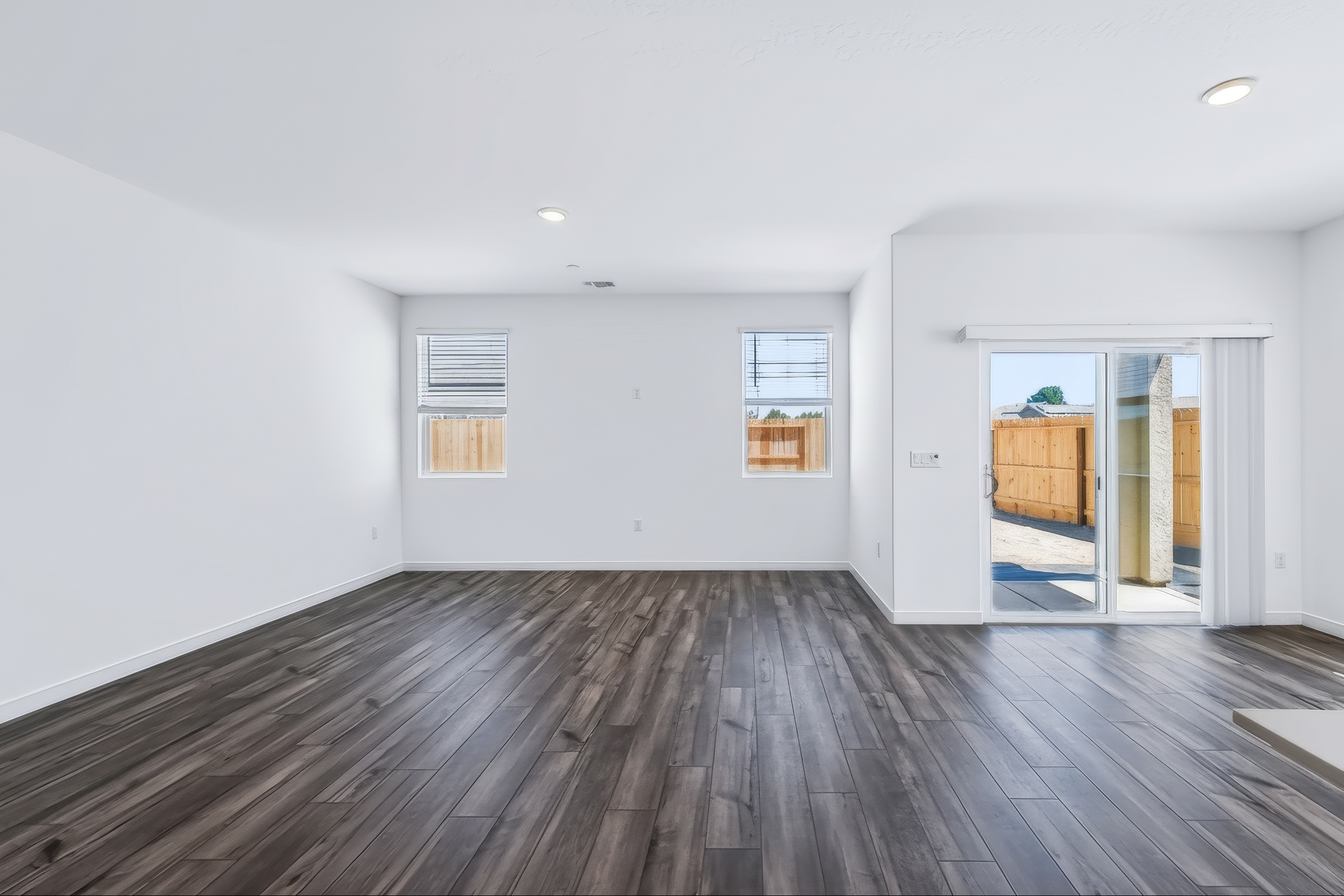 A room with a wood floor and a wood floor.