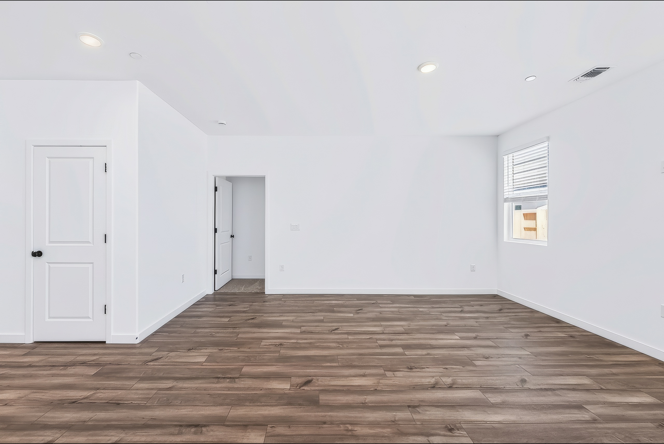 A room with white doors.