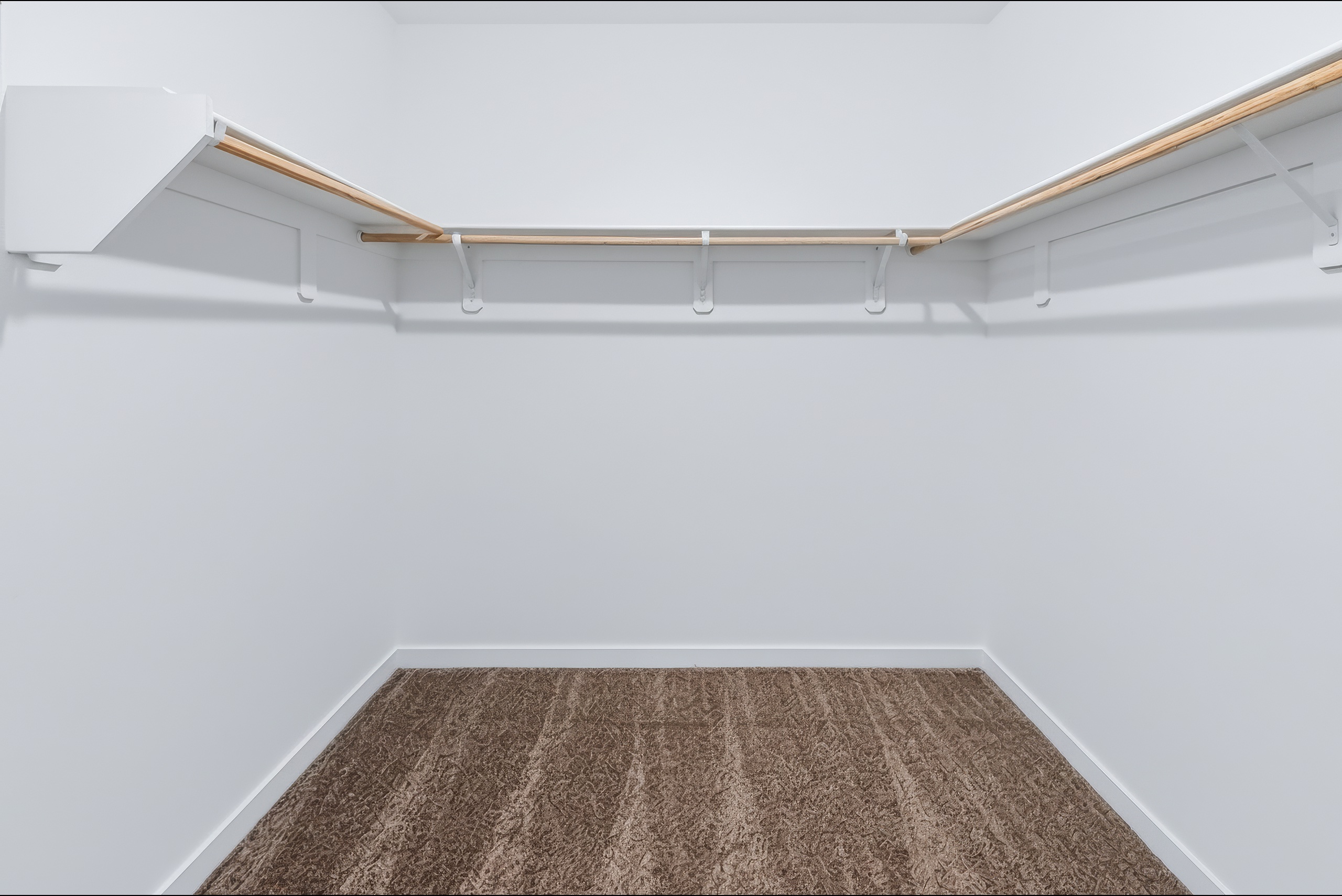 A wooden ceiling with a carpet.