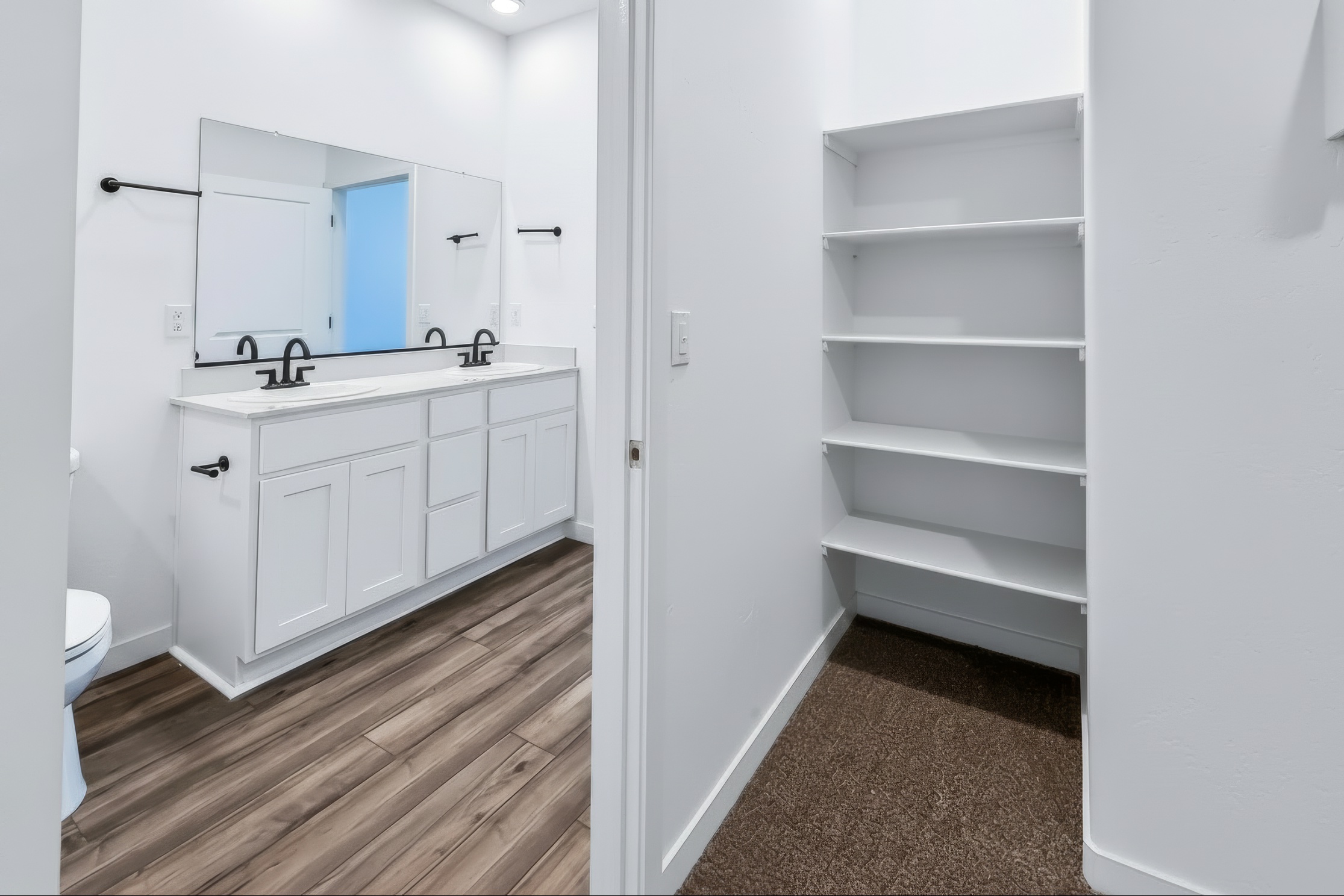 A bathroom with a white cabinet.