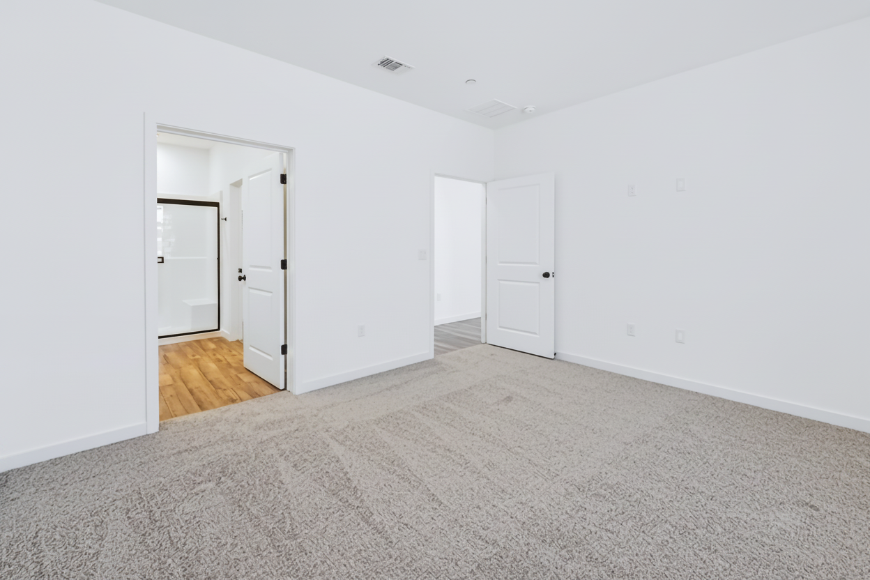 A room with white doors.