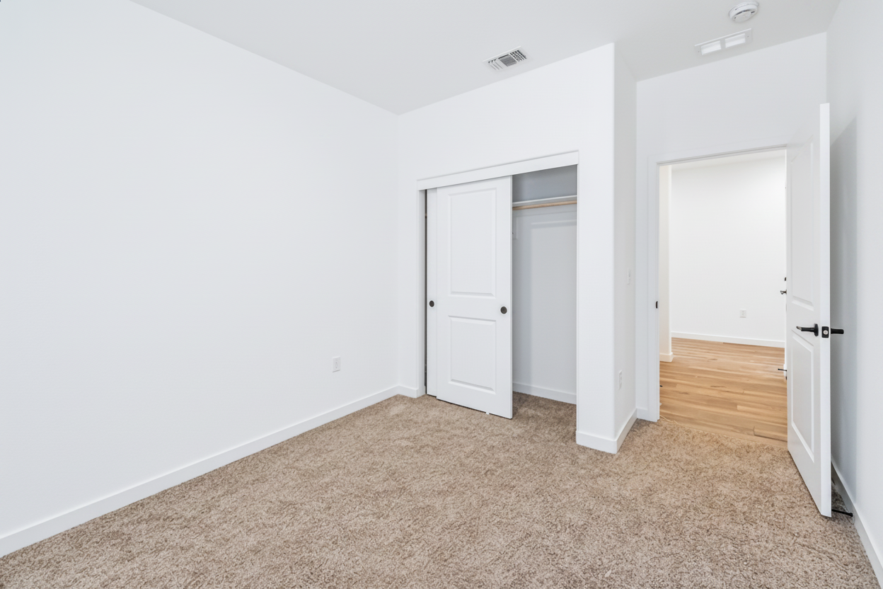 A room with white doors.