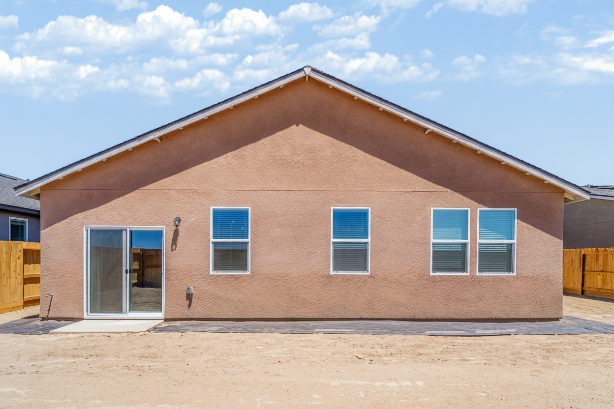 A brown house with windows.
