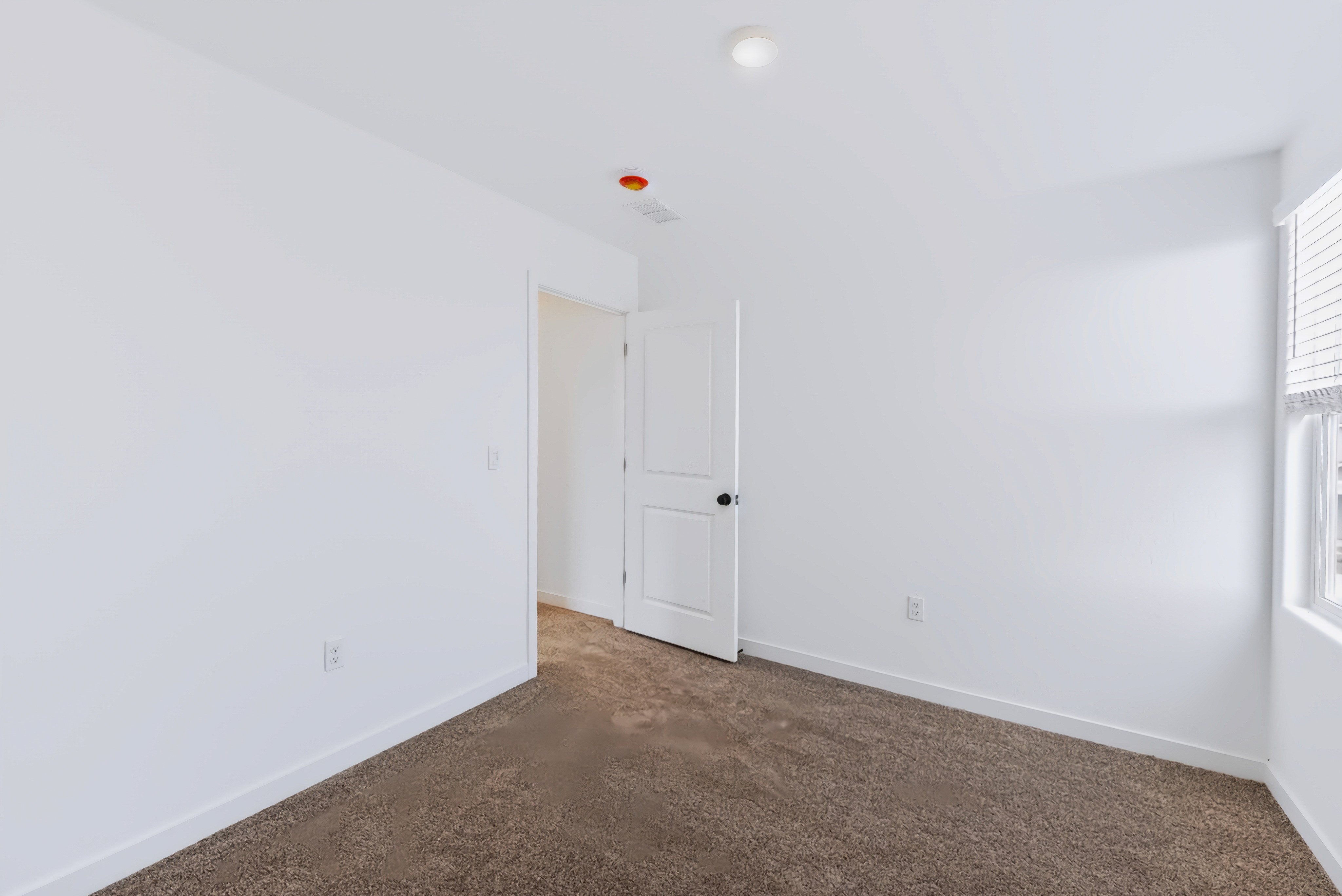 A room with white walls.