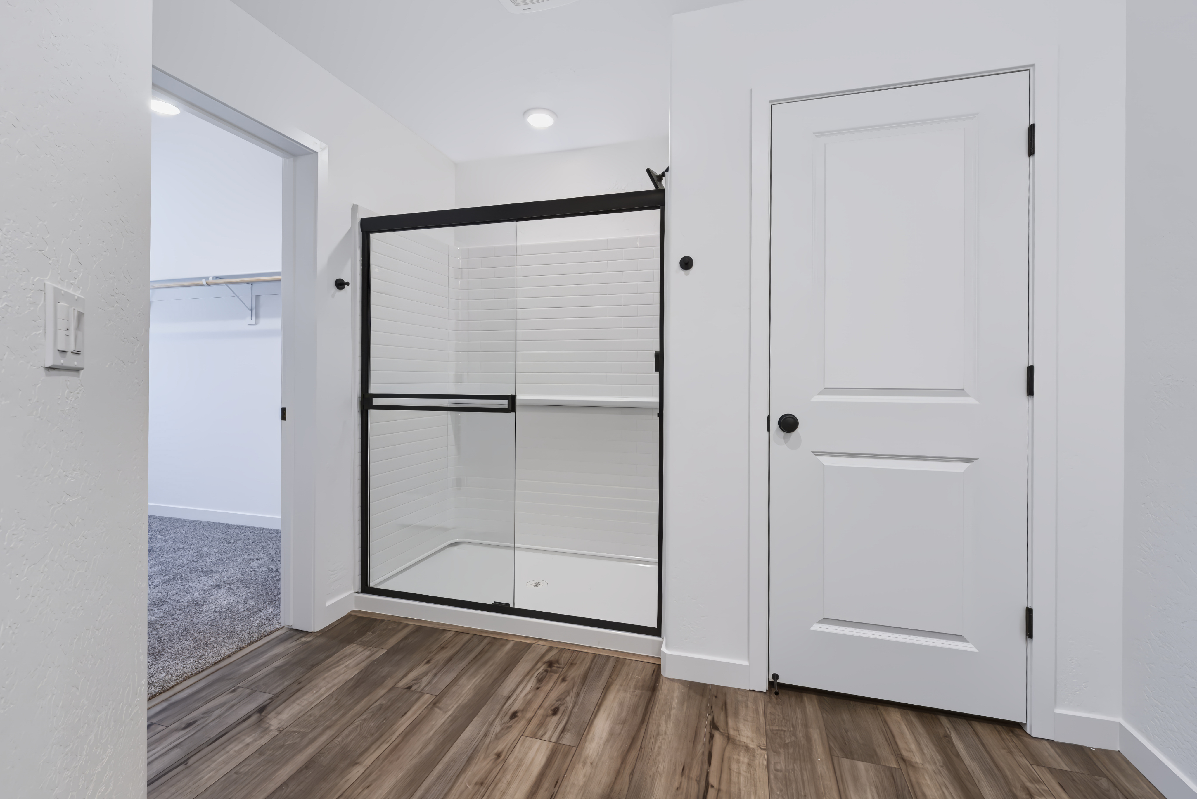 A white closet in a room.