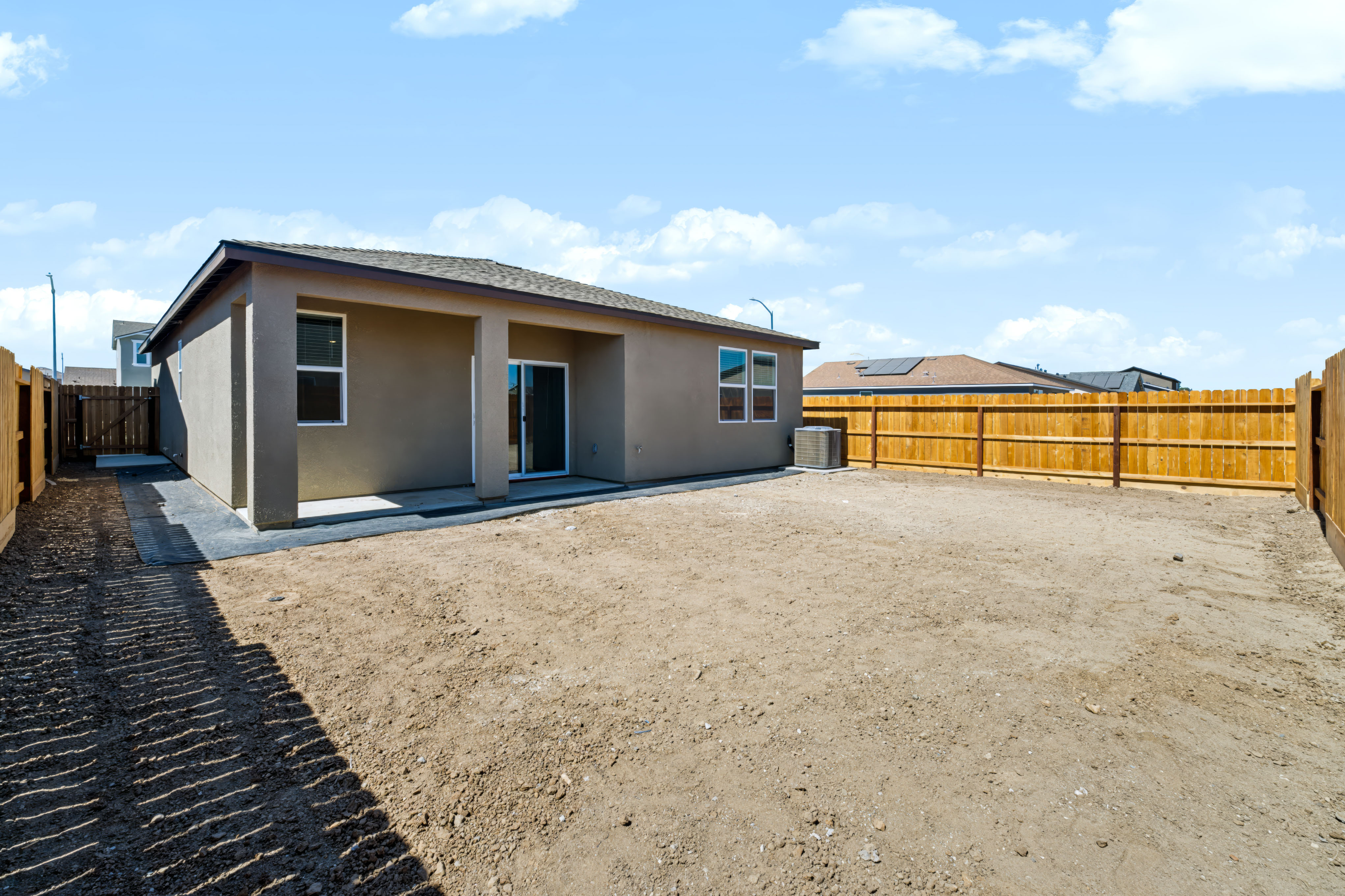 A house with a fence around it.