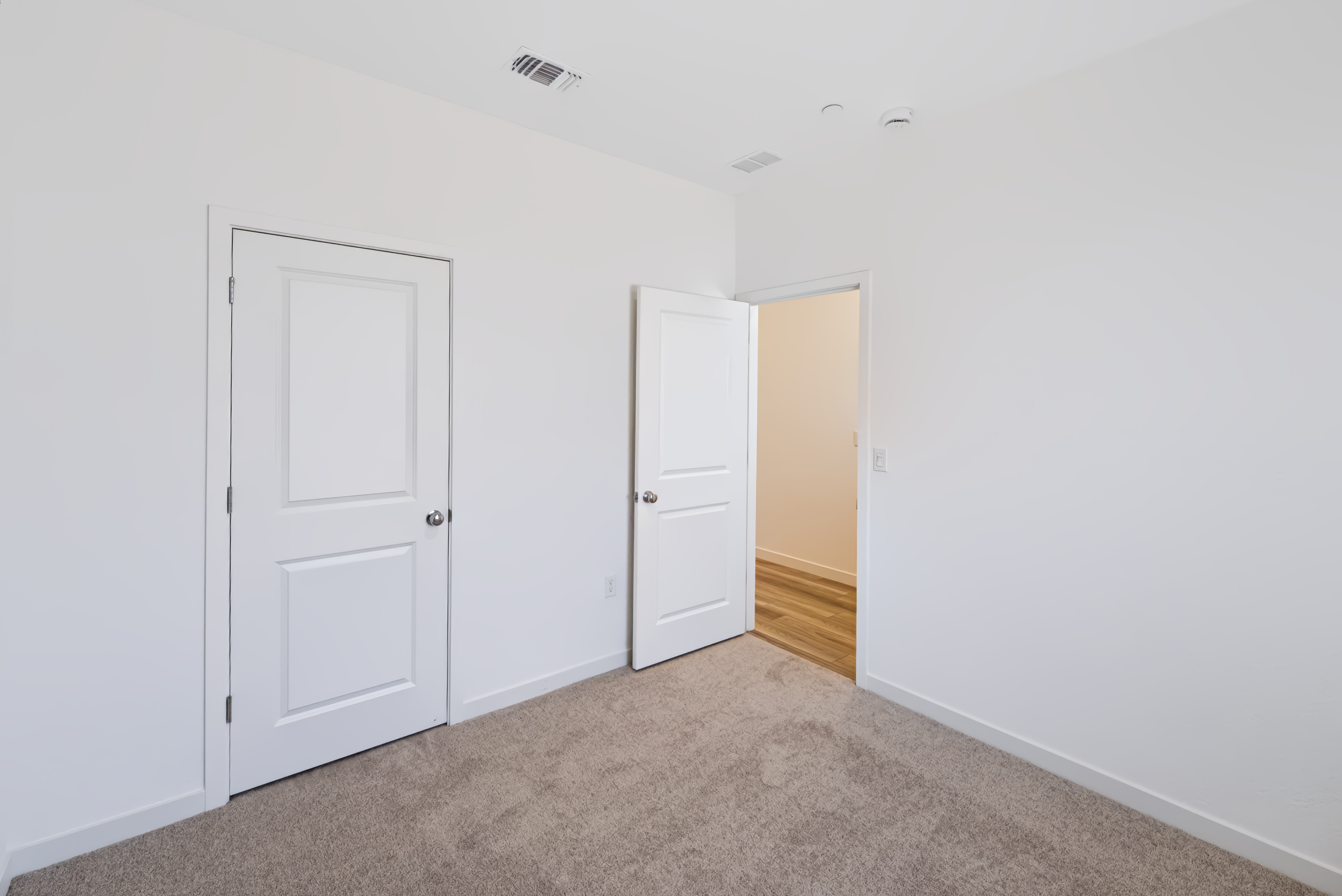 A room with white doors.