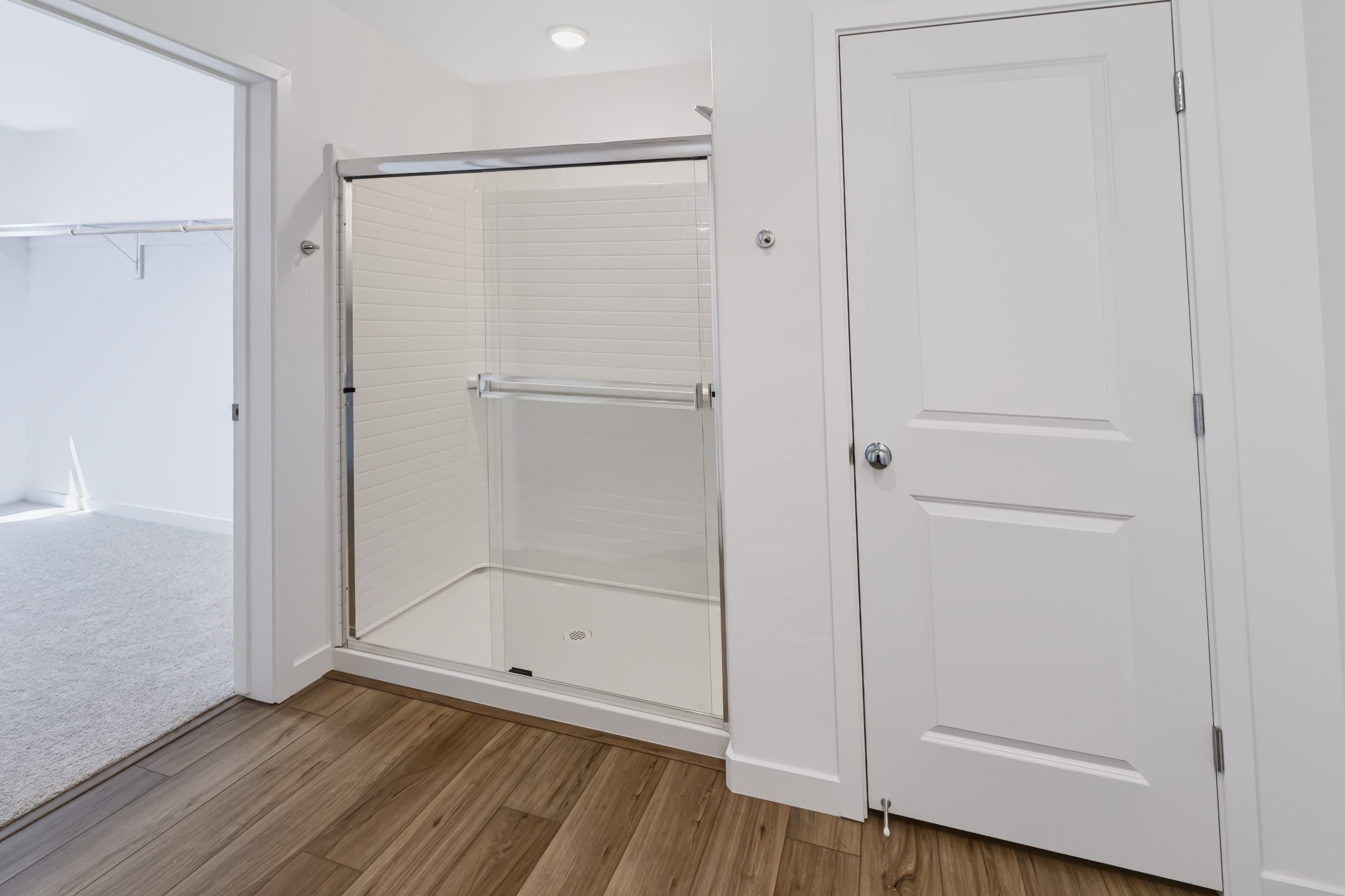 A white closet in a room.