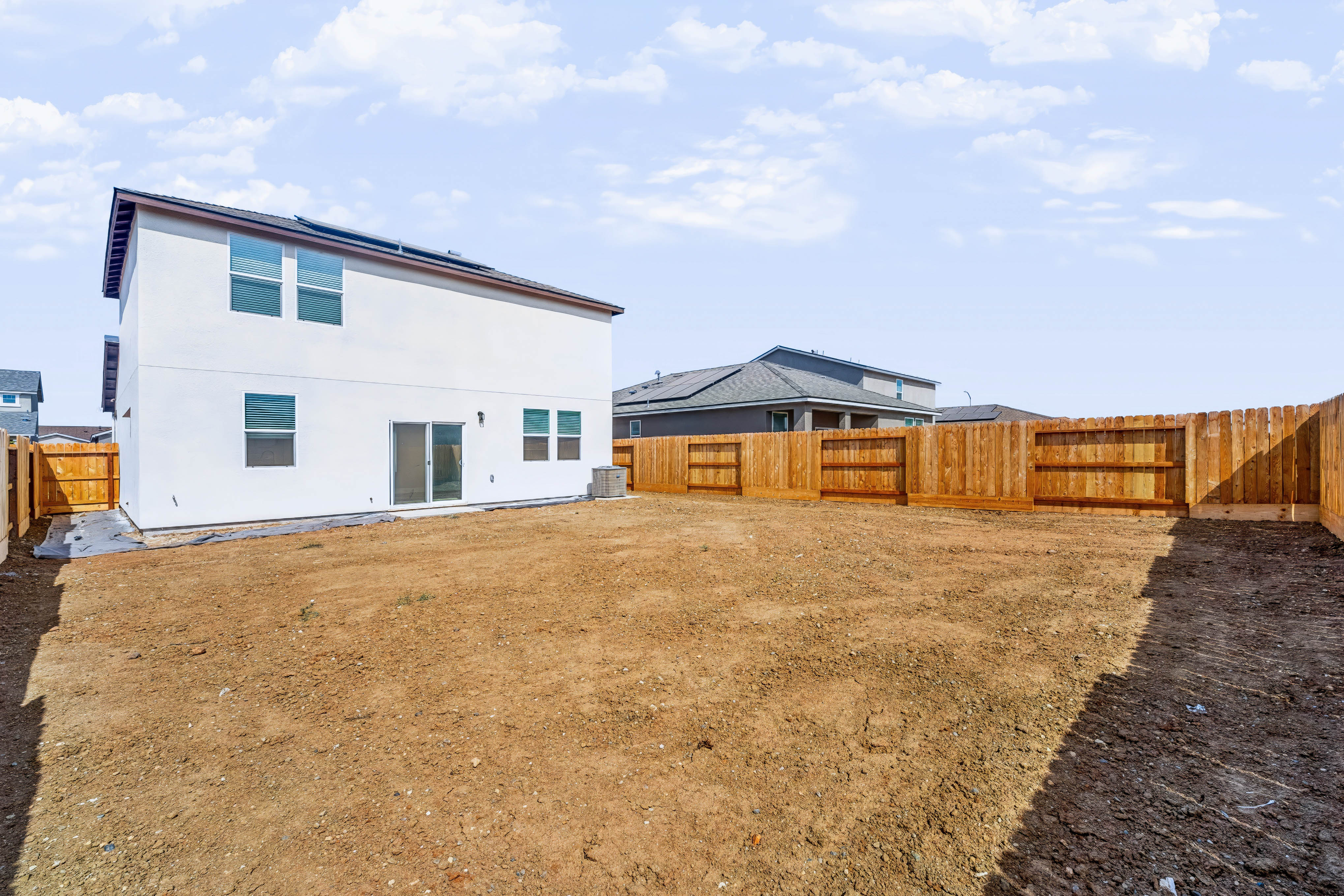 A house with a fence around it.