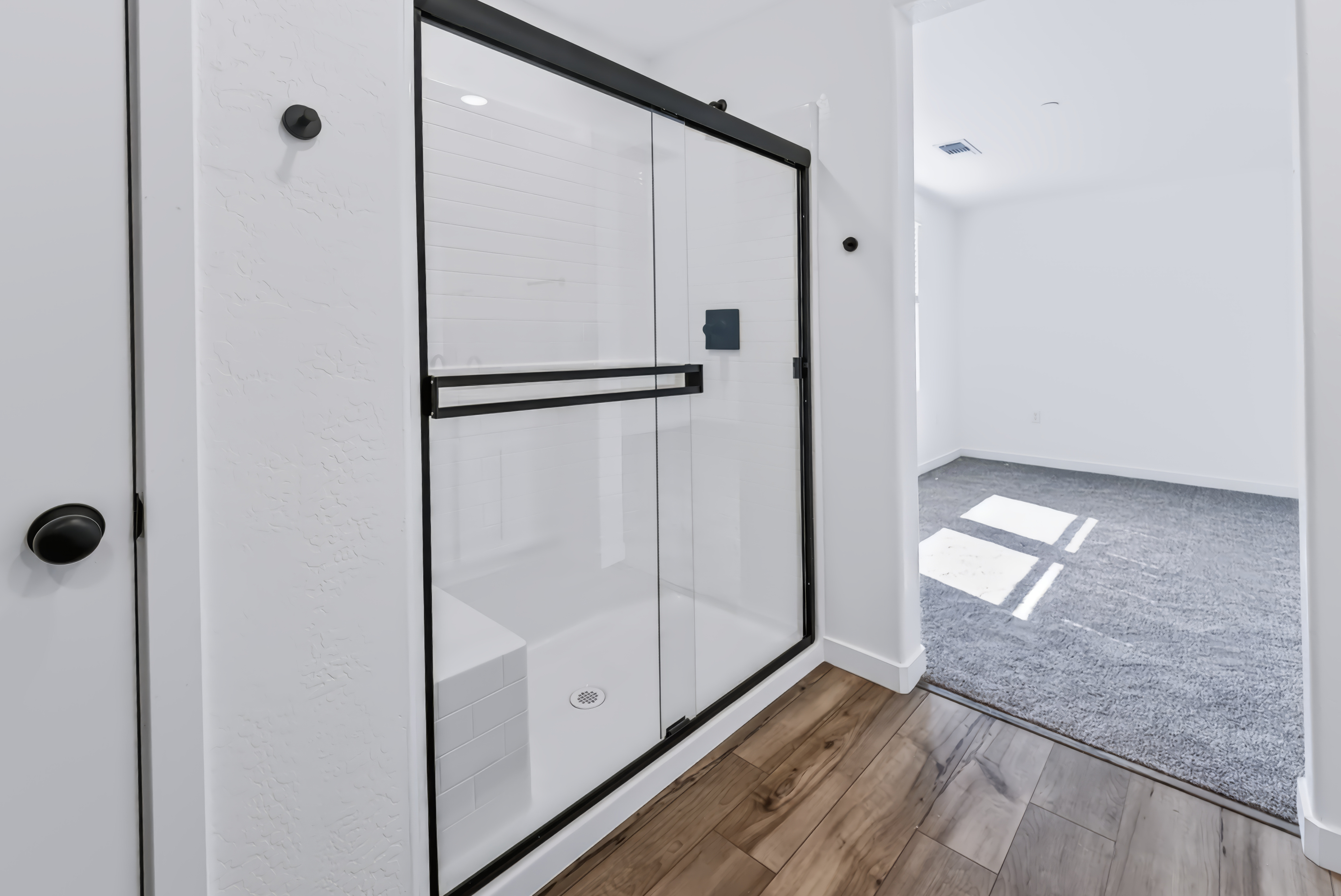 A white cabinet in a room.