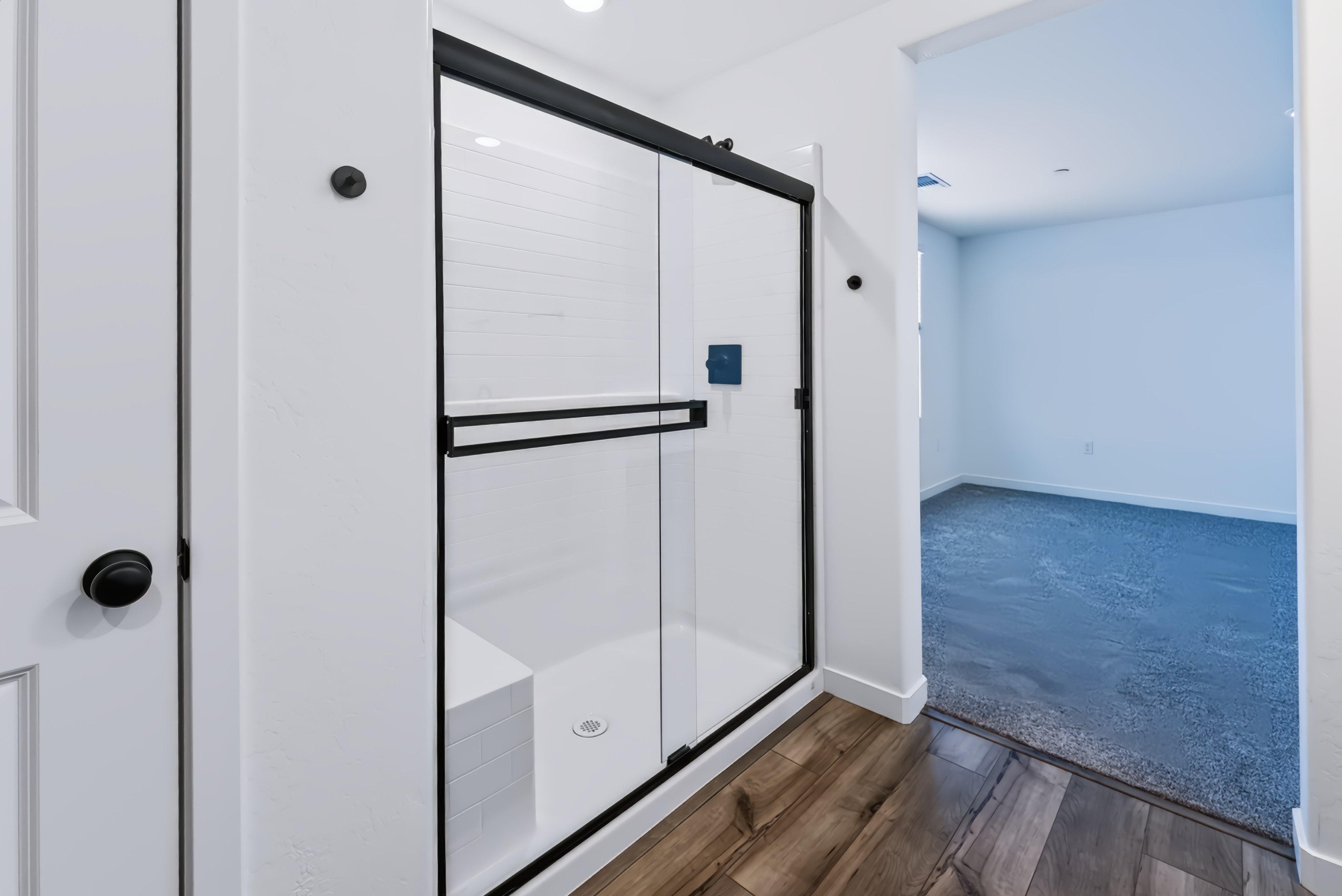 A room with white cabinets.
