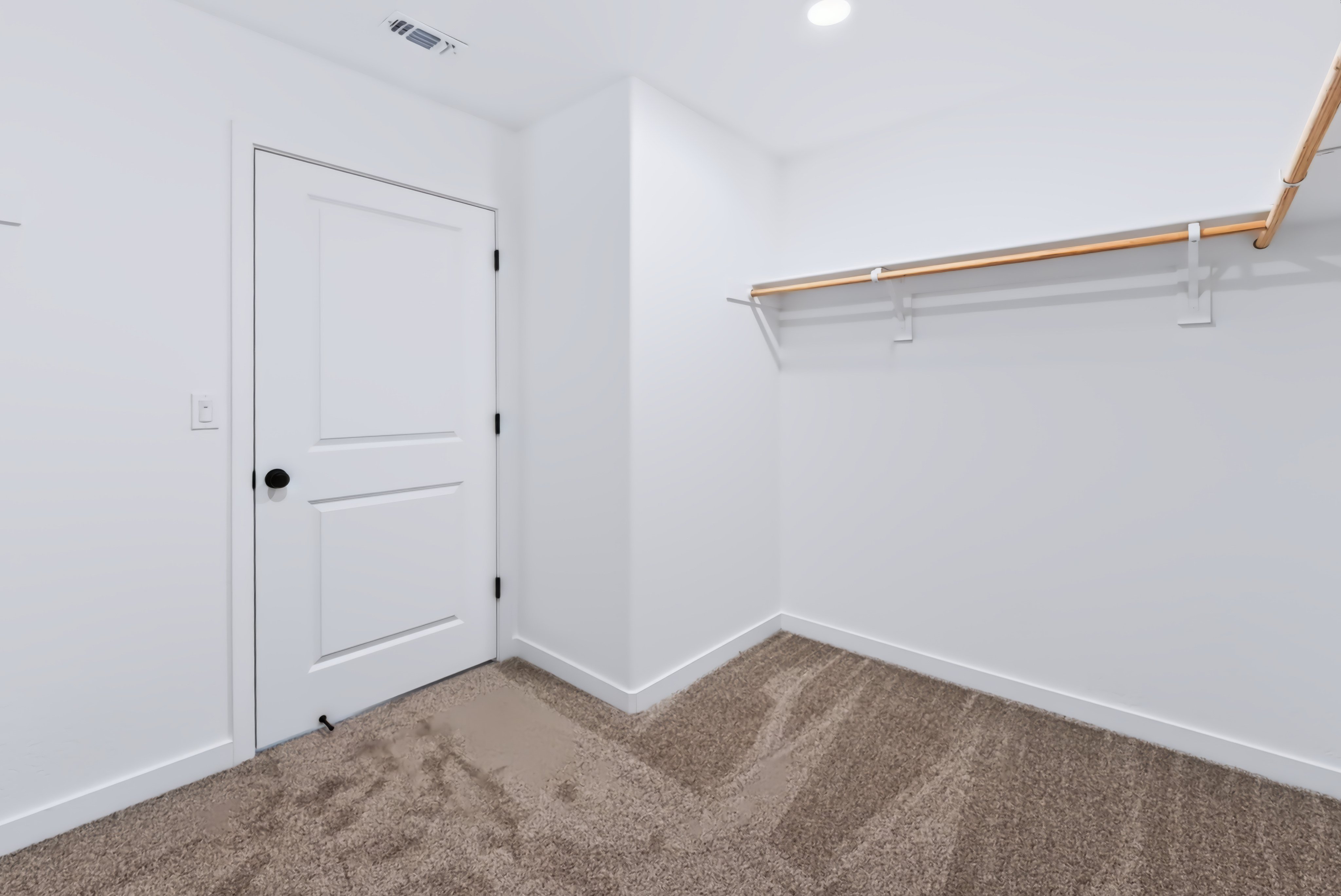A room with white doors.