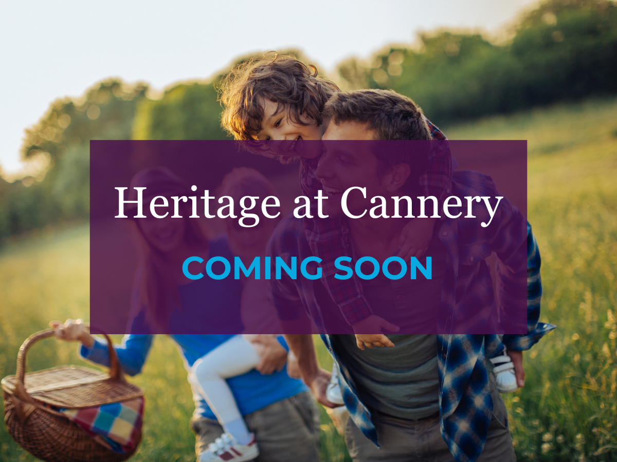 A person carrying a child in a basket.