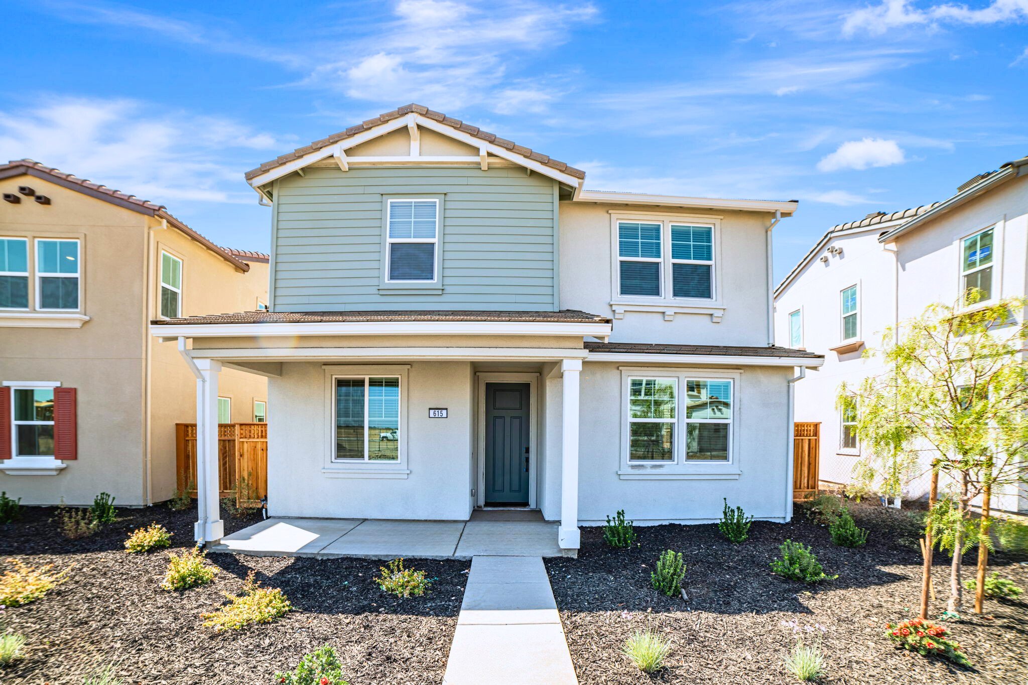 A house with a driveway.