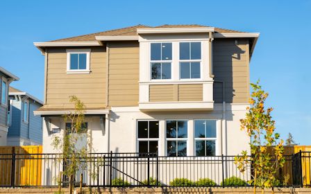 A house with a fence around it.