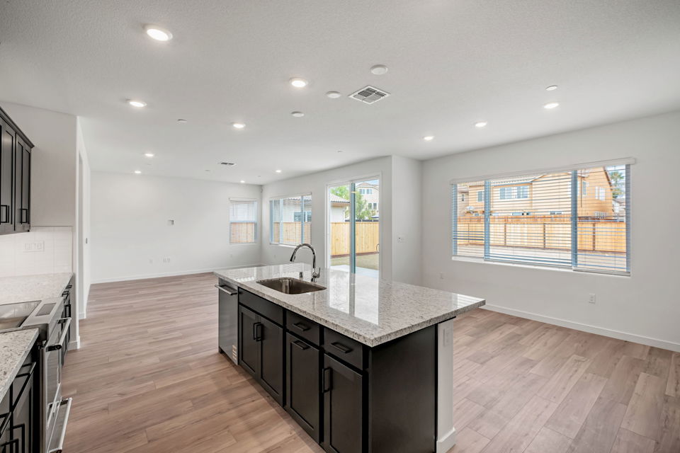 A kitchen with a large island.
