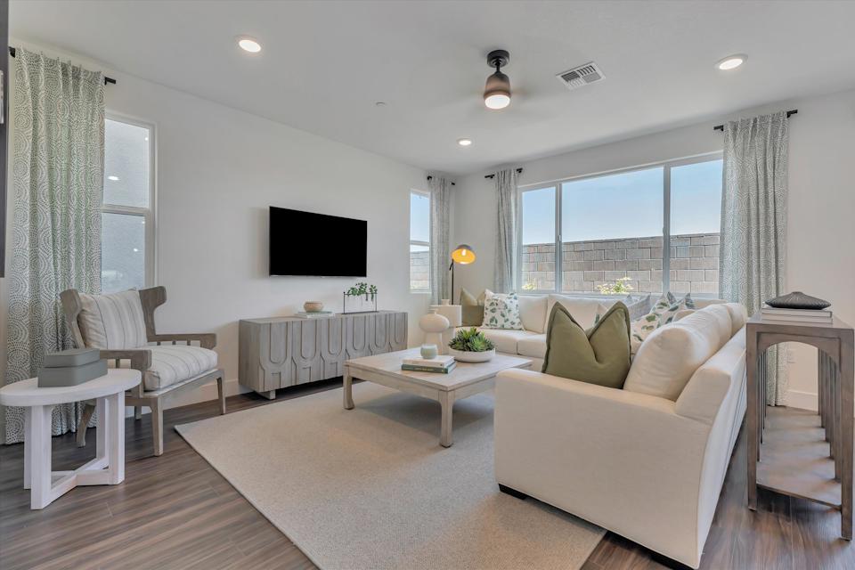 A living room with a large window.