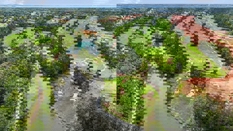 A river with a small waterfall.